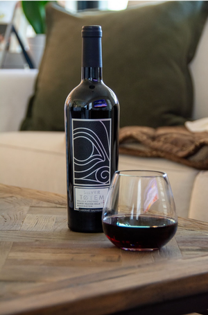 A pacific rim dry red wine for cooking on a coffee table.
