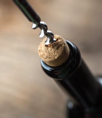 How to open a wine bottle without a corkscrew.