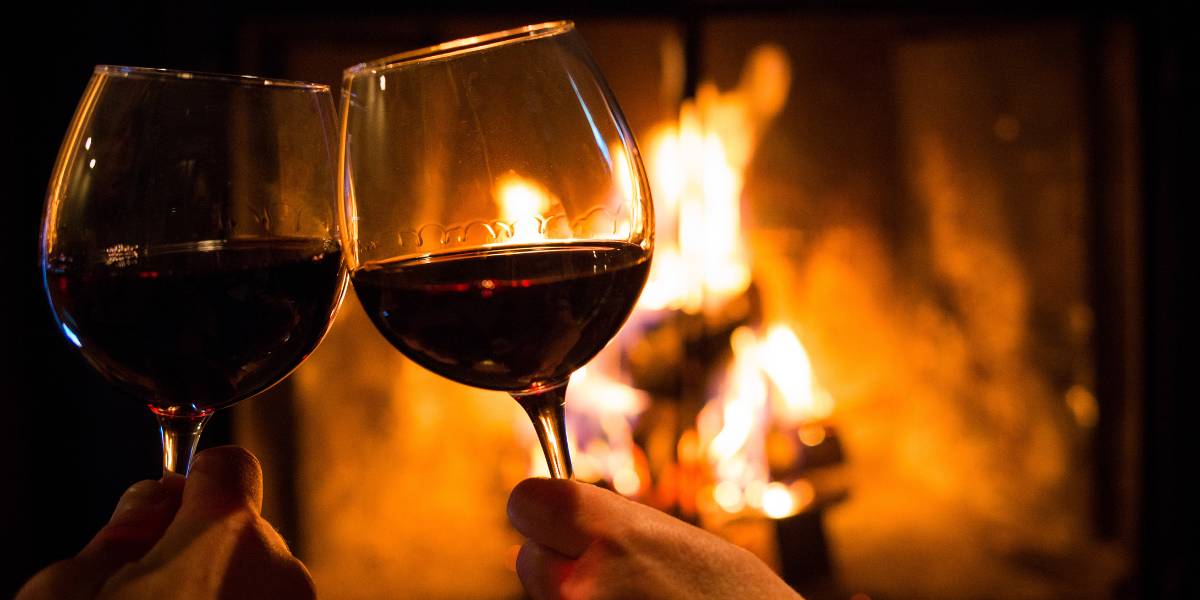 Winter wine pairing by a fire.